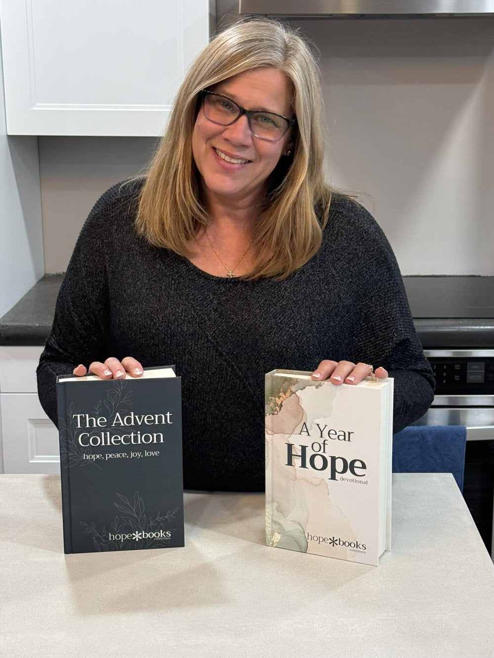 A reader holding A Year of Hope
